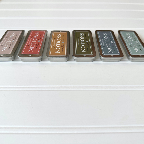 Signature Slide + Lock Notions Tin