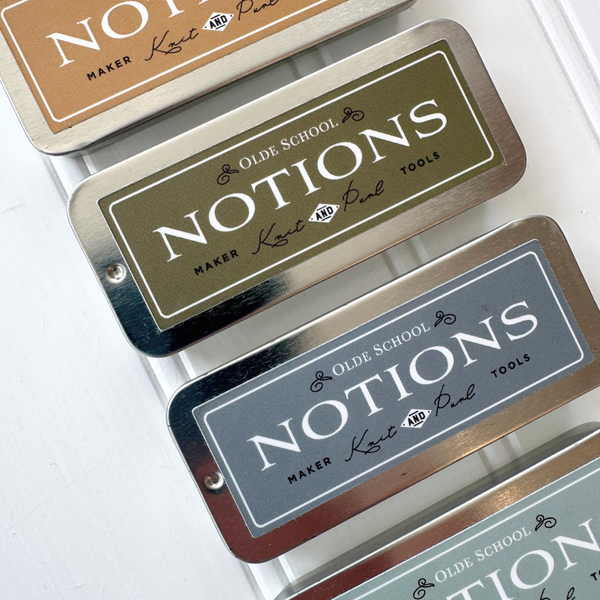 Signature Slide + Lock Notions Tin